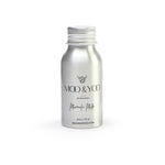 travel sized mini miracle milk leave in conditioner in an aluminium bottle