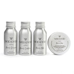 travel sized mini shampoo, condiitoner, mask and milk leave in conditioner in aluminium bottles and jars