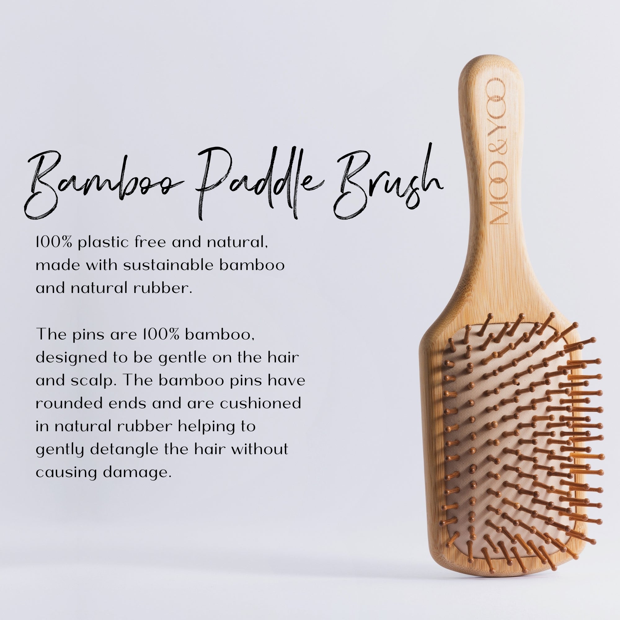 Bamboo paddle brush with text describing brush composition on a light gray background