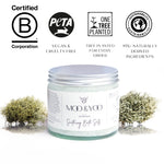 Jar of bath salt with certification logos on a white background