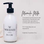 Moo & Yoo Miracle Milk bottle with product details on a light background