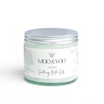 Jar of 'Moo & Yoo' soothing bath salts on a white background