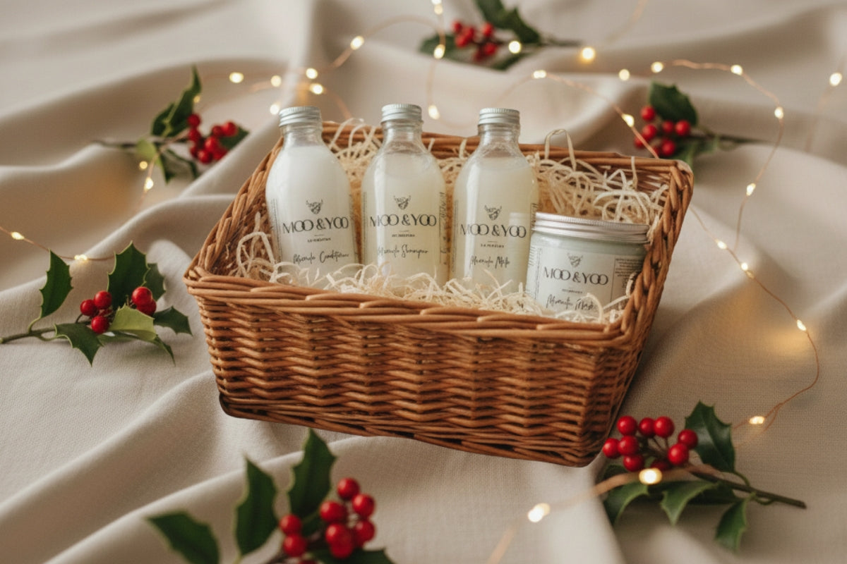 A gift box inclusing some Moo & Yoo products is sitting on a christmassy background.