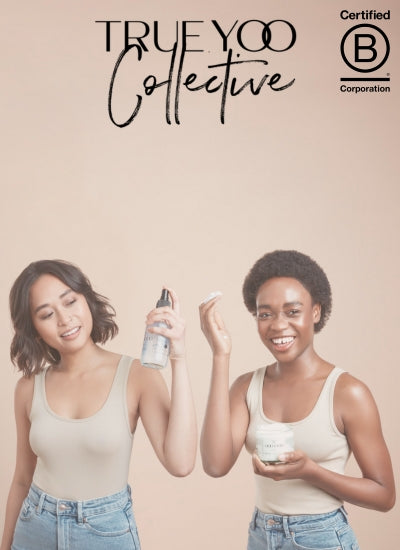 true yoo collective loyalty programme logo with girl on the left spraying salt spray in her short wavy brown hair and girl on the right about to put curl cream in her cropped black afro textured hair 