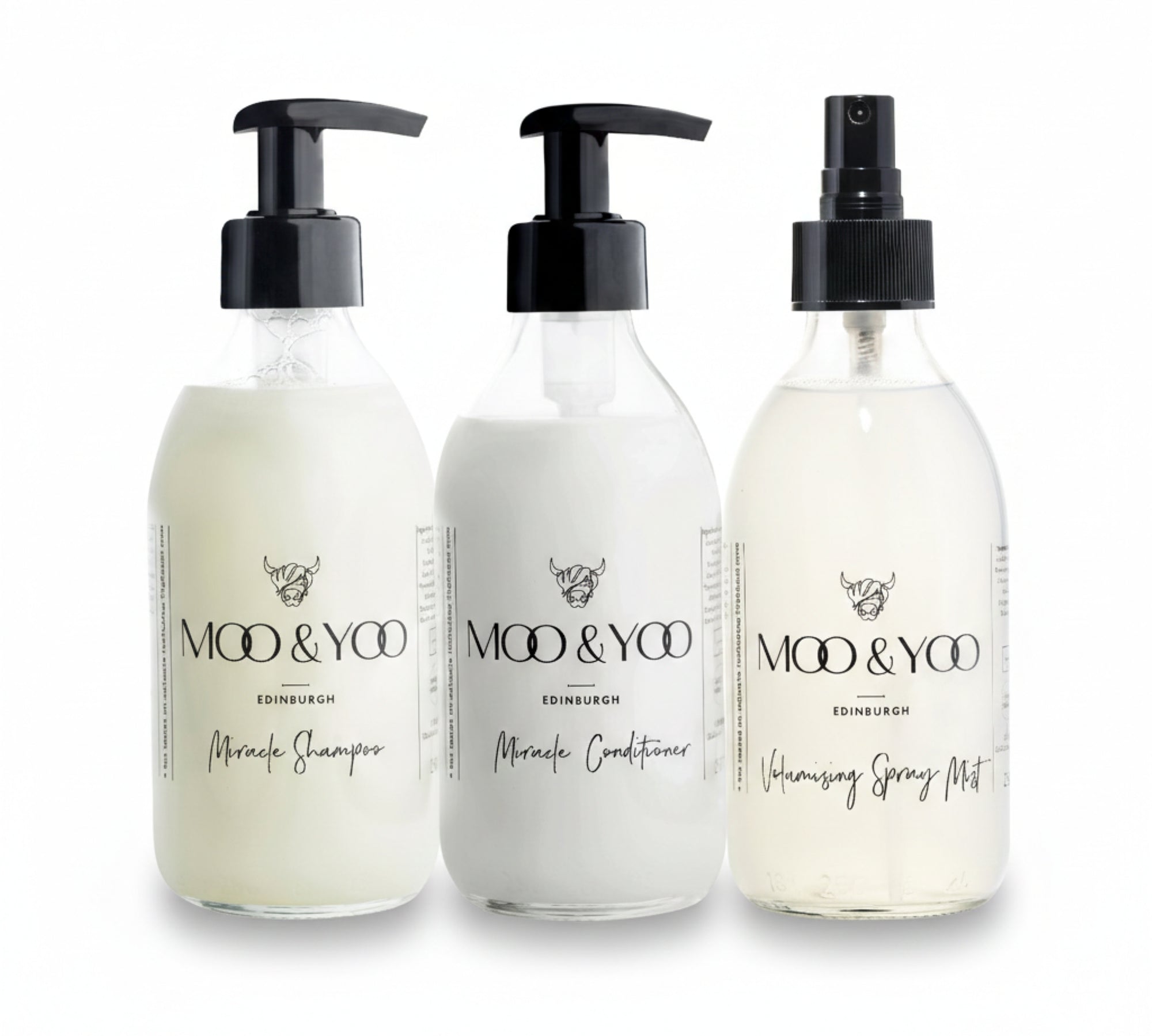 three Moo & Yoo products housed in glass bottles ined up horizontally, consisting of our Miracle Shampoo, Miracle Conditioner and Volumising Spray Mist against a white background. This bundle is designed for fine or flat hair 
