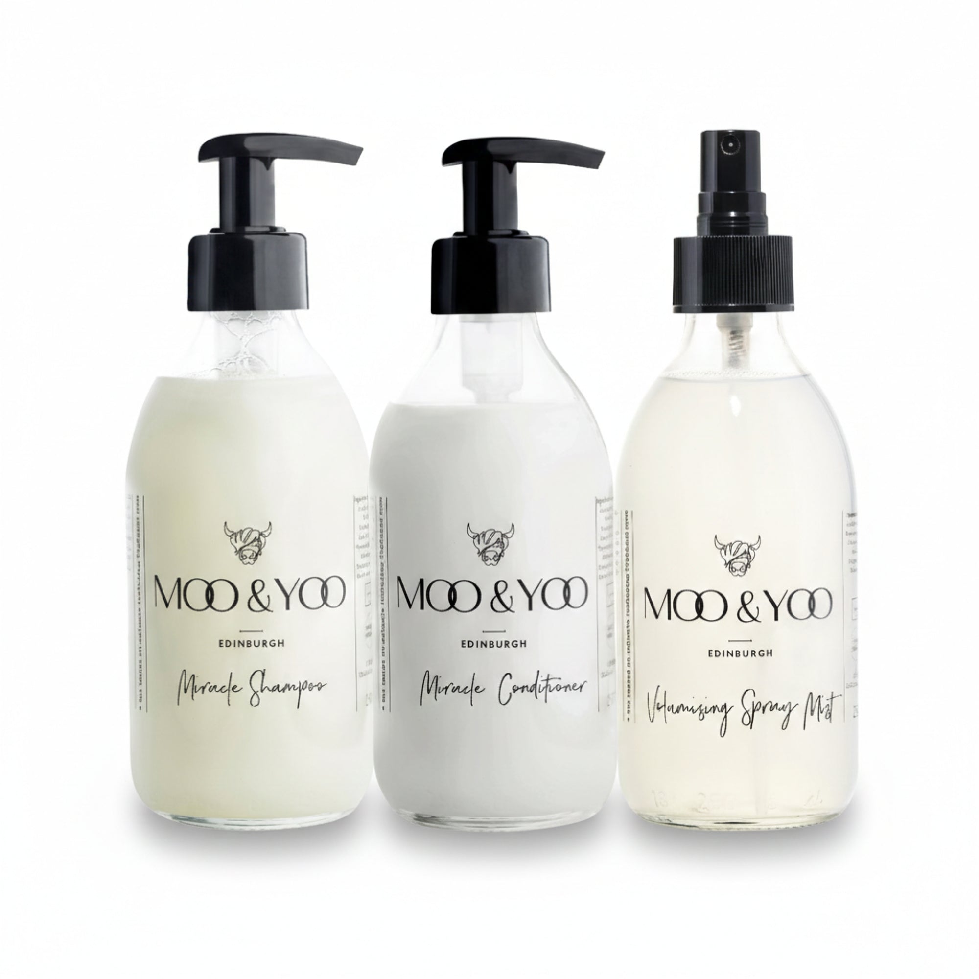 three Moo & Yoo products housed in glass bottles ined up horizontally, consisting of our Miracle Shampoo, Miracle Conditioner and Volumising Spray Mist against a white background. This bundle is designed for fine or flat hair 