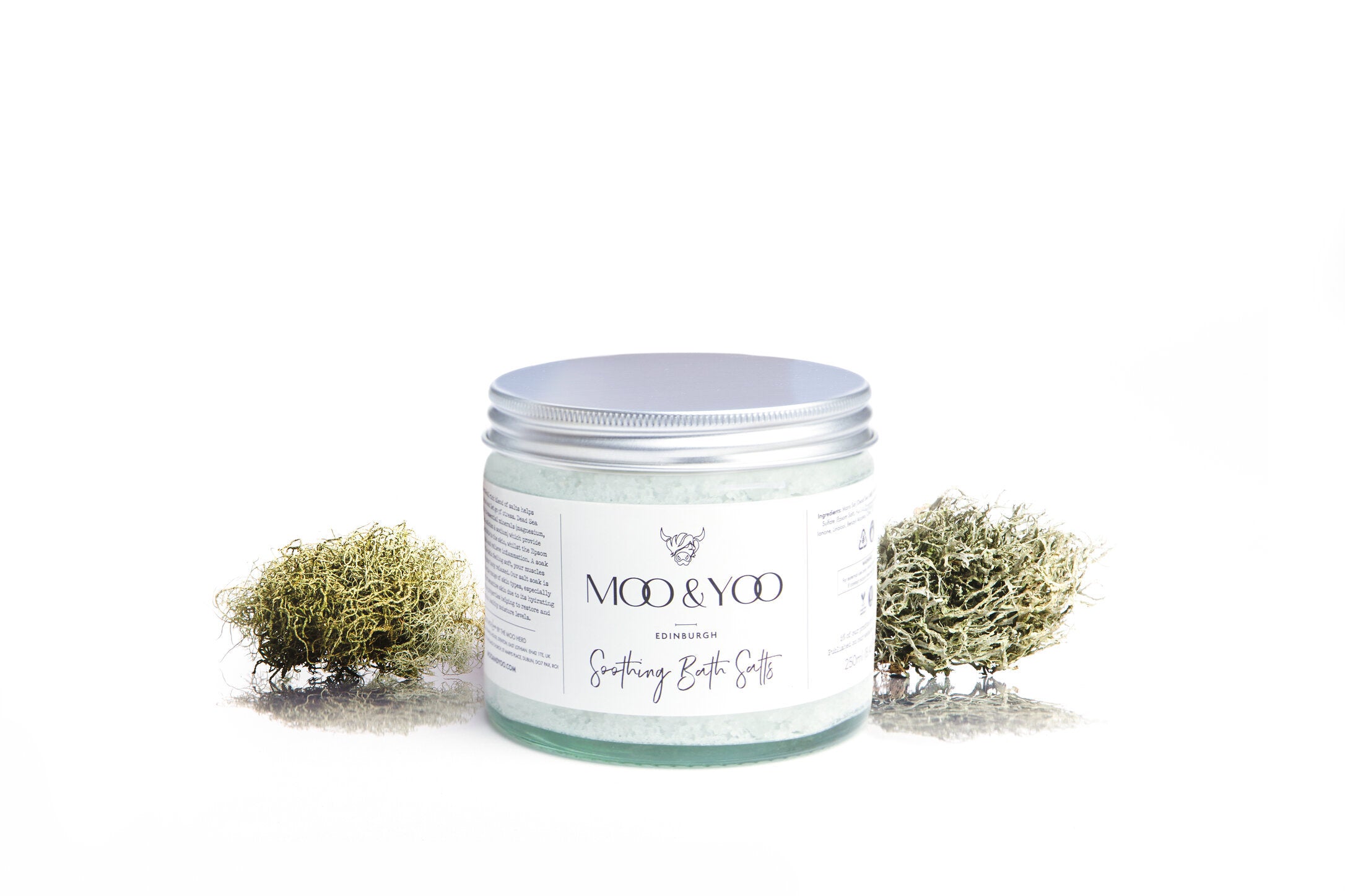 Image of Moo and Yoo Soothing Bath Salts on a plain white background with a spring of Icelandic Moss on each side.