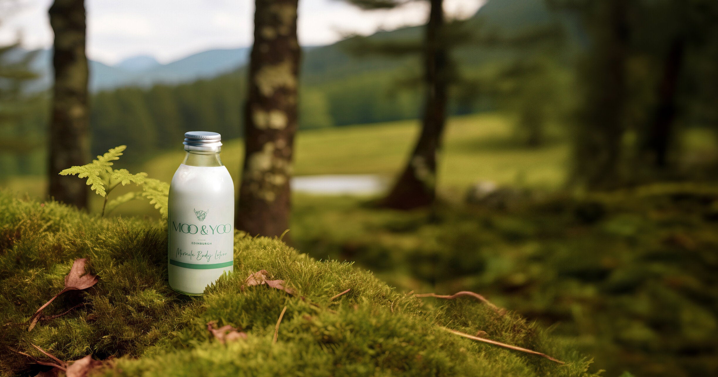 Body lotion in glass bottle with aluminium lid in the forest on a bed of moss 