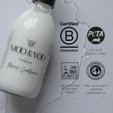 Bottle of Moo & Yoo Miracle Conditioner with certification logos on a gray background