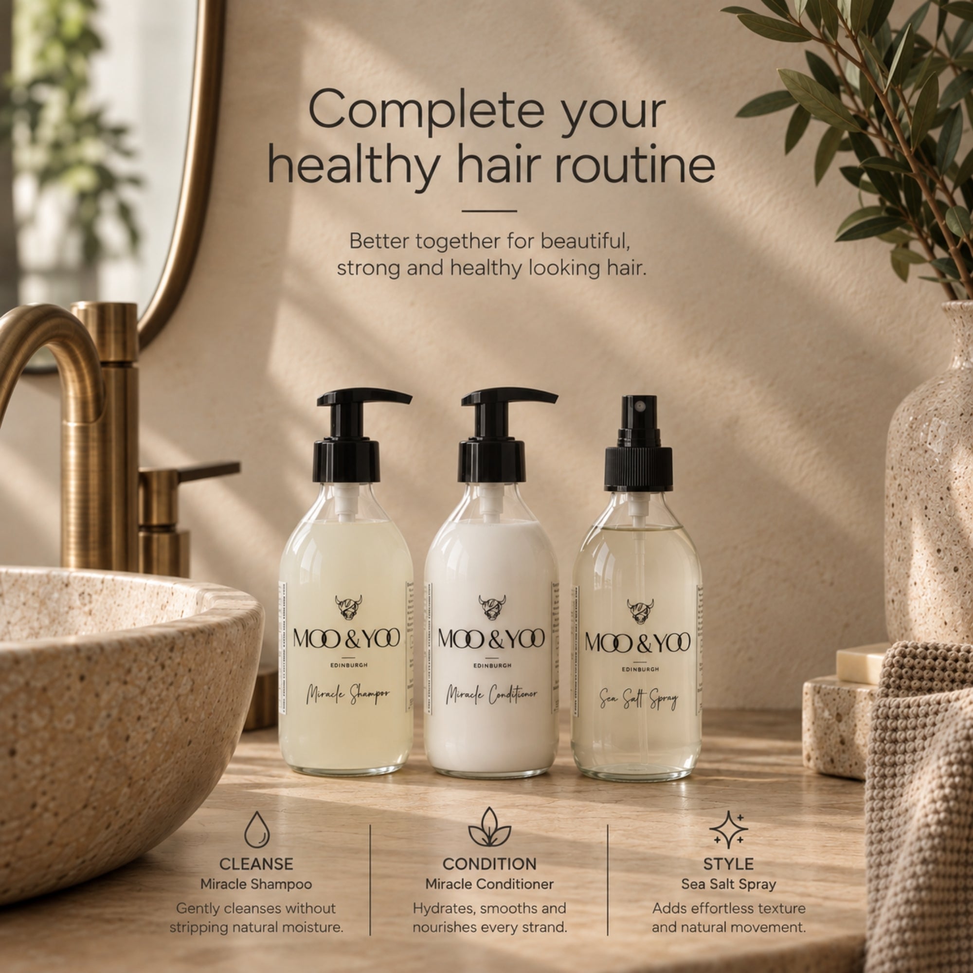 Three MOD & YCO hair care bottles arranged on a bathroom counter beside a sink and mirror, with promotional text above and feature callouts below. The products appear to be a shampoo, conditioner, and sea salt spray.