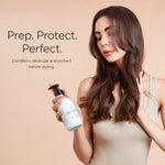 A woman with long wavy brown hair holds a white pump bottle of moo anb yoo miracle milk hair product against a warm beige background, with text reading 'Prep. Protect. Perfect