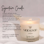 Moo & Yoo candle with product description on a light background