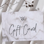 Gift card with creamy hair mask texture background and brand logo on a white background sheet with some branches 