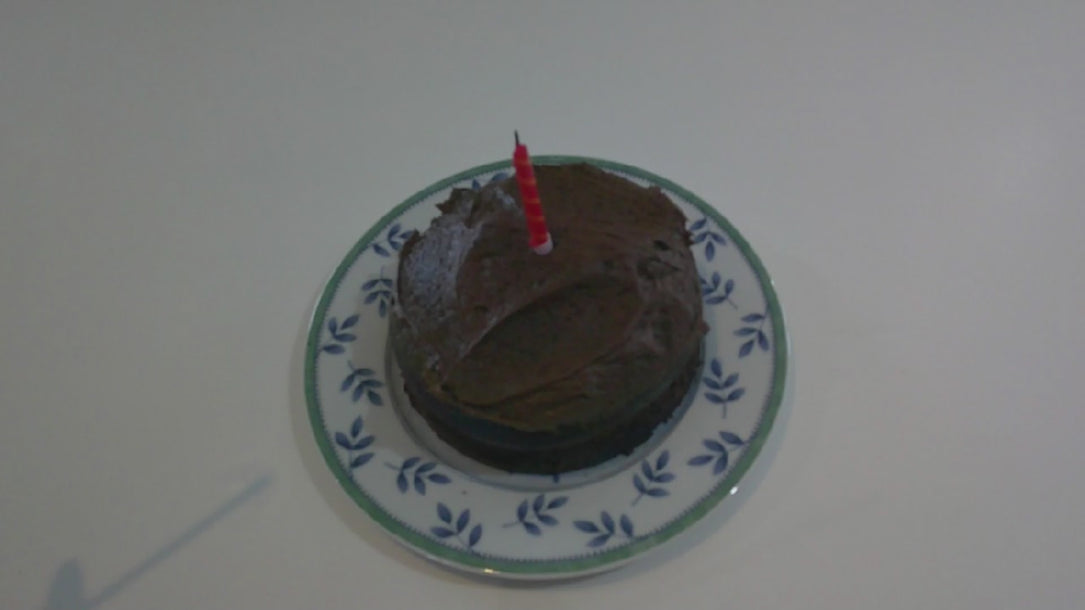 Video for moo & yoo 6th birthday sale. Video includes a small chocolate cake, candle being lit, some of the team blowing out the candle and eating the cake celebrating 
