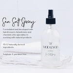 Sea Salt Spray bottle with text about product on a white background