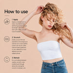 A woman with long, wavy blonde hair models a white tube top while demonstrating a hair styling product. The left side features a beige instructional panel titled 'How to use' with three numbered steps: Apply, Scrunch, and Refresh, accompanied by simple icons.